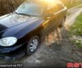 Черный Дэу Ланос, объемом двигателя 1.5 л и пробегом 249 тыс. км за 2500 $, фото 1 на Automoto.ua