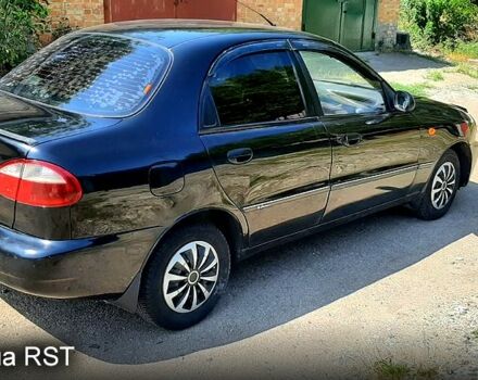 Черный Дэу Ланос, объемом двигателя 1.5 л и пробегом 200 тыс. км за 2350 $, фото 2 на Automoto.ua