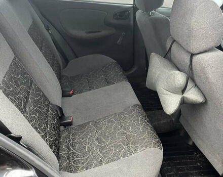 Черный Дэу Ланос, объемом двигателя 1.5 л и пробегом 201 тыс. км за 1000 $, фото 12 на Automoto.ua