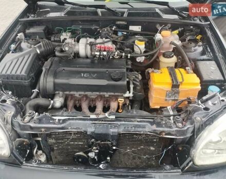 Черный Дэу Ланос, объемом двигателя 1.6 л и пробегом 200 тыс. км за 1499 $, фото 6 на Automoto.ua