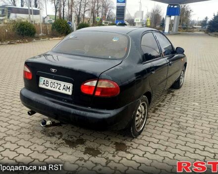 Черный Дэу Ланос, объемом двигателя 1.6 л и пробегом 200 тыс. км за 1600 $, фото 3 на Automoto.ua