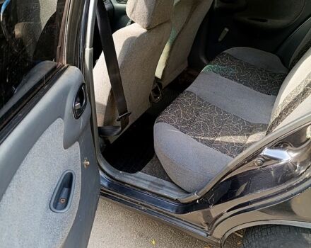 Дэу Ланос 2007 в Днепре (Днепропетровске) на Automoto.ua Черный Дэу Ланос, объемом двигателя 1.5 л и пробегом 217 тыс. км за 1650 $, фото 7 на Automoto.ua