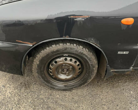 Черный Дэу Ланос, объемом двигателя 1.5 л и пробегом 201 тыс. км за 1000 $, фото 5 на Automoto.ua