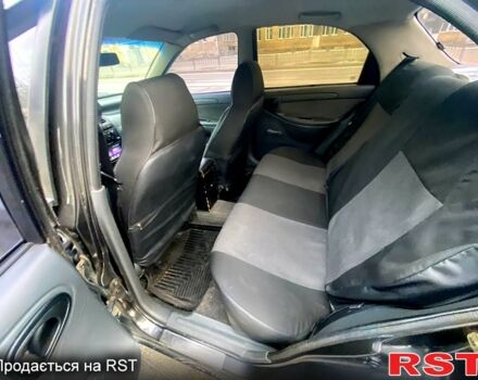 Черный Дэу Ланос, объемом двигателя 1.5 л и пробегом 220 тыс. км за 1350 $, фото 9 на Automoto.ua