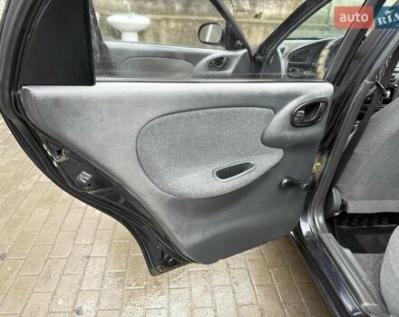 Черный Дэу Ланос, объемом двигателя 0 л и пробегом 150 тыс. км за 1250 $, фото 8 на Automoto.ua