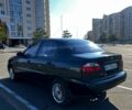 Черный Дэу Ланос, объемом двигателя 1.4 л и пробегом 152 тыс. км за 2550 $, фото 2 на Automoto.ua