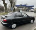 Чорний Деу Ланос, об'ємом двигуна 1.5 л та пробігом 167 тис. км за 2999 $, фото 4 на Automoto.ua