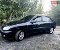 Черный Дэу Ланос, объемом двигателя 1.6 л и пробегом 160 тыс. км за 3150 $, фото 2 на Automoto.ua