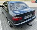 Чорний Деу Ланос, об'ємом двигуна 1.5 л та пробігом 230 тис. км за 2500 $, фото 1 на Automoto.ua