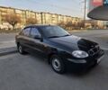 Черный Дэу Ланос, объемом двигателя 1.5 л и пробегом 174 тыс. км за 2500 $, фото 1 на Automoto.ua