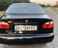 Чорний Деу Ланос, об'ємом двигуна 1.5 л та пробігом 161 тис. км за 3150 $, фото 34 на Automoto.ua