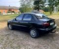 Черный Дэу Ланос, объемом двигателя 1.6 л и пробегом 158 тыс. км за 1380 $, фото 5 на Automoto.ua