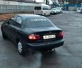 Черный Дэу Ланос, объемом двигателя 1.5 л и пробегом 450 тыс. км за 1750 $, фото 5 на Automoto.ua