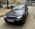 Черный Дэу Ланос, объемом двигателя 1.4 л и пробегом 150 тыс. км за 1500 $, фото 1 на Automoto.ua