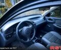 Черный Дэу Ланос, объемом двигателя 1.4 л и пробегом 220 тыс. км за 1800 $, фото 7 на Automoto.ua