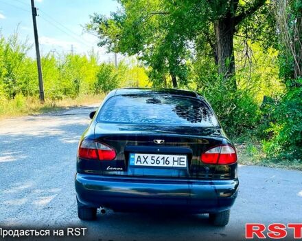Черный Дэу Ланос, объемом двигателя 1.4 л и пробегом 303 тыс. км за 1199 $, фото 8 на Automoto.ua