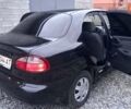 Черный Дэу Ланос, объемом двигателя 1.5 л и пробегом 159 тыс. км за 2850 $, фото 6 на Automoto.ua