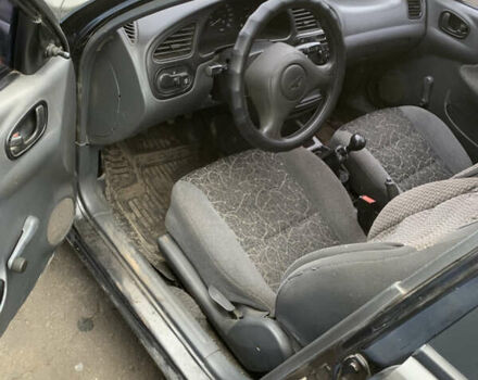 Черный Дэу Ланос, объемом двигателя 1.5 л и пробегом 119 тыс. км за 2700 $, фото 5 на Automoto.ua