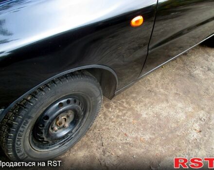 Черный Дэу Ланос, объемом двигателя 1.5 л и пробегом 230 тыс. км за 2000 $, фото 6 на Automoto.ua