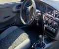 Черный Дэу Ланос, объемом двигателя 1.4 л и пробегом 200 тыс. км за 1600 $, фото 1 на Automoto.ua