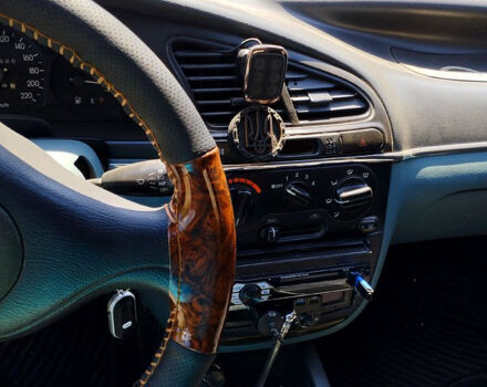 Черный Дэу Ланос, объемом двигателя 1.5 л и пробегом 240 тыс. км за 3300 $, фото 6 на Automoto.ua