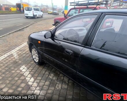 Черный Дэу Ланос, объемом двигателя 1.5 л и пробегом 220 тыс. км за 1000 $, фото 9 на Automoto.ua