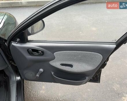 Черный Дэу Ланос, объемом двигателя 1.5 л и пробегом 128 тыс. км за 2999 $, фото 54 на Automoto.ua