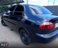Черный Дэу Ланос, объемом двигателя 1.6 л и пробегом 300 тыс. км за 2800 $, фото 5 на Automoto.ua