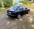 Черный Дэу Ланос, объемом двигателя 1.6 л и пробегом 158 тыс. км за 1380 $, фото 3 на Automoto.ua