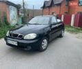 Черный Дэу Ланос, объемом двигателя 1.5 л и пробегом 152 тыс. км за 2450 $, фото 1 на Automoto.ua