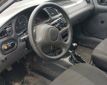 Чорний Деу Ланос, об'ємом двигуна 1.4 л та пробігом 180 тис. км за 1600 $, фото 2 на Automoto.ua