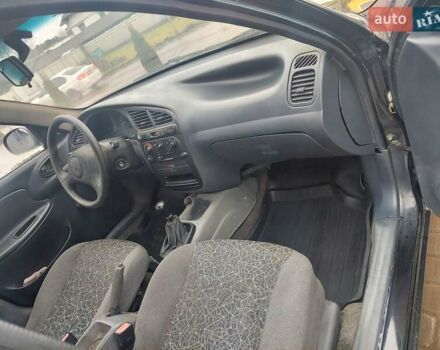 Черный Дэу Ланос, объемом двигателя 1.5 л и пробегом 185 тыс. км за 2100 $, фото 15 на Automoto.ua