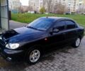 Черный Дэу Ланос, объемом двигателя 1.4 л и пробегом 230 тыс. км за 2800 $, фото 1 на Automoto.ua