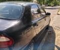 Чорний Деу Ланос, об'ємом двигуна 1.5 л та пробігом 120 тис. км за 2600 $, фото 1 на Automoto.ua