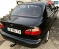 Черный Дэу Ланос, объемом двигателя 1.5 л и пробегом 200 тыс. км за 3300 $, фото 1 на Automoto.ua
