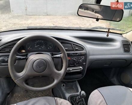Черный Дэу Ланос, объемом двигателя 1.5 л и пробегом 300 тыс. км за 1900 $, фото 6 на Automoto.ua