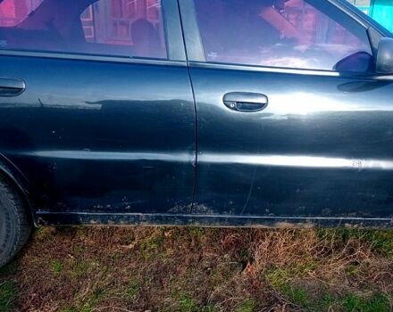 Черный Дэу Ланос, объемом двигателя 1.5 л и пробегом 286 тыс. км за 1000 $, фото 5 на Automoto.ua