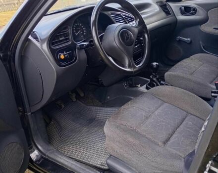 Черный Дэу Ланос, объемом двигателя 1.5 л и пробегом 171 тыс. км за 1600 $, фото 9 на Automoto.ua