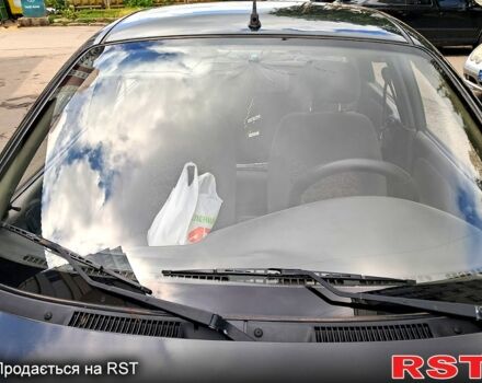 Черный Дэу Ланос, объемом двигателя 1.4 л и пробегом 200 тыс. км за 1950 $, фото 2 на Automoto.ua