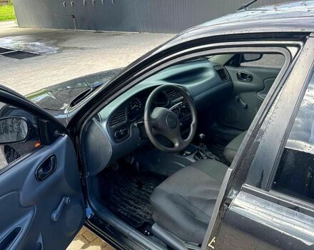 Чорний Деу Ланос, об'ємом двигуна 1.5 л та пробігом 63 тис. км за 3700 $, фото 9 на Automoto.ua