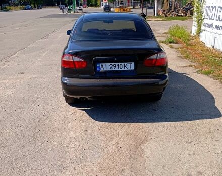 Черный Дэу Ланос, объемом двигателя 1.4 л и пробегом 200 тыс. км за 1600 $, фото 4 на Automoto.ua