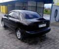 Черный Дэу Ланос, объемом двигателя 1.4 л и пробегом 230 тыс. км за 2800 $, фото 6 на Automoto.ua