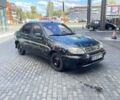 Черный Дэу Ланос, объемом двигателя 1.5 л и пробегом 225 тыс. км за 1350 $, фото 1 на Automoto.ua