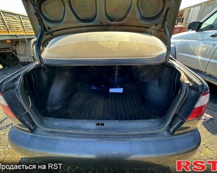 Черный Дэу Ланос, объемом двигателя 1.5 л и пробегом 516 тыс. км за 1770 $, фото 11 на Automoto.ua