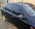 Черный Дэу Ланос, объемом двигателя 1.5 л и пробегом 230 тыс. км за 2500 $, фото 4 на Automoto.ua
