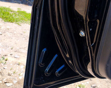 Черный Дэу Ланос, объемом двигателя 1.5 л и пробегом 240 тыс. км за 3300 $, фото 5 на Automoto.ua