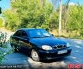 Черный Дэу Ланос, объемом двигателя 1.4 л и пробегом 303 тыс. км за 1199 $, фото 1 на Automoto.ua