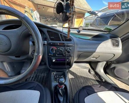 Чорний Деу Ланос, об'ємом двигуна 1.5 л та пробігом 77 тис. км за 2900 $, фото 11 на Automoto.ua