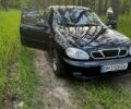 Черный Дэу Ланос, объемом двигателя 1.5 л и пробегом 244 тыс. км за 3100 $, фото 1 на Automoto.ua