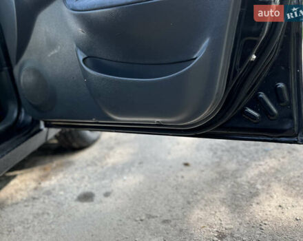 Черный Дэу Ланос, объемом двигателя 1.5 л и пробегом 300 тыс. км за 2400 $, фото 13 на Automoto.ua